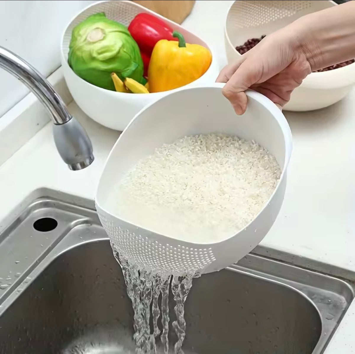 Rice washing bowl with built-in strainer draining water
