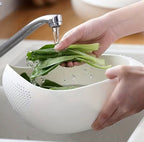 Kitchen washing and draining bowl for vegetables