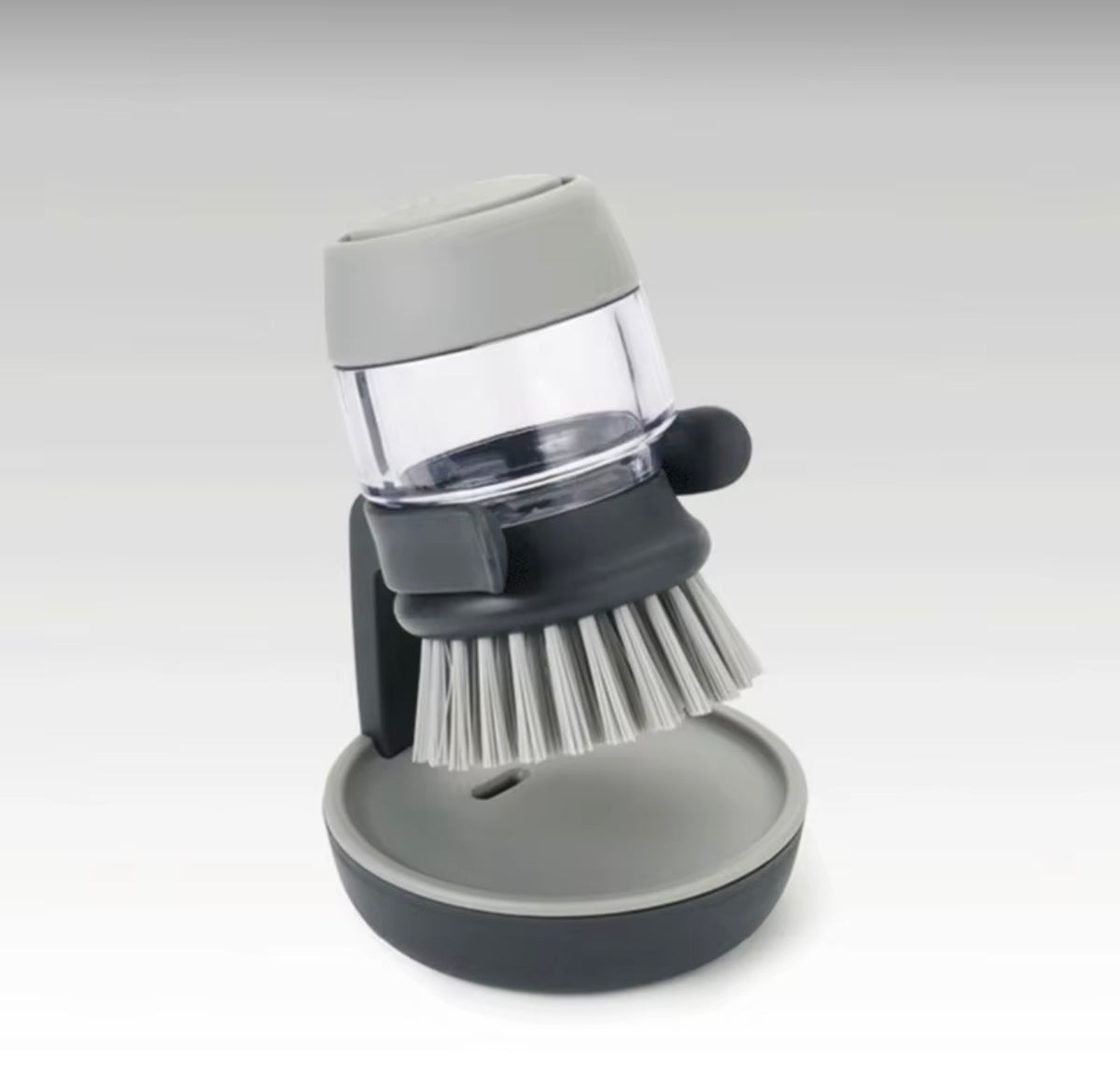 Soap dispensing sink cleaning brush with holder and drip tray